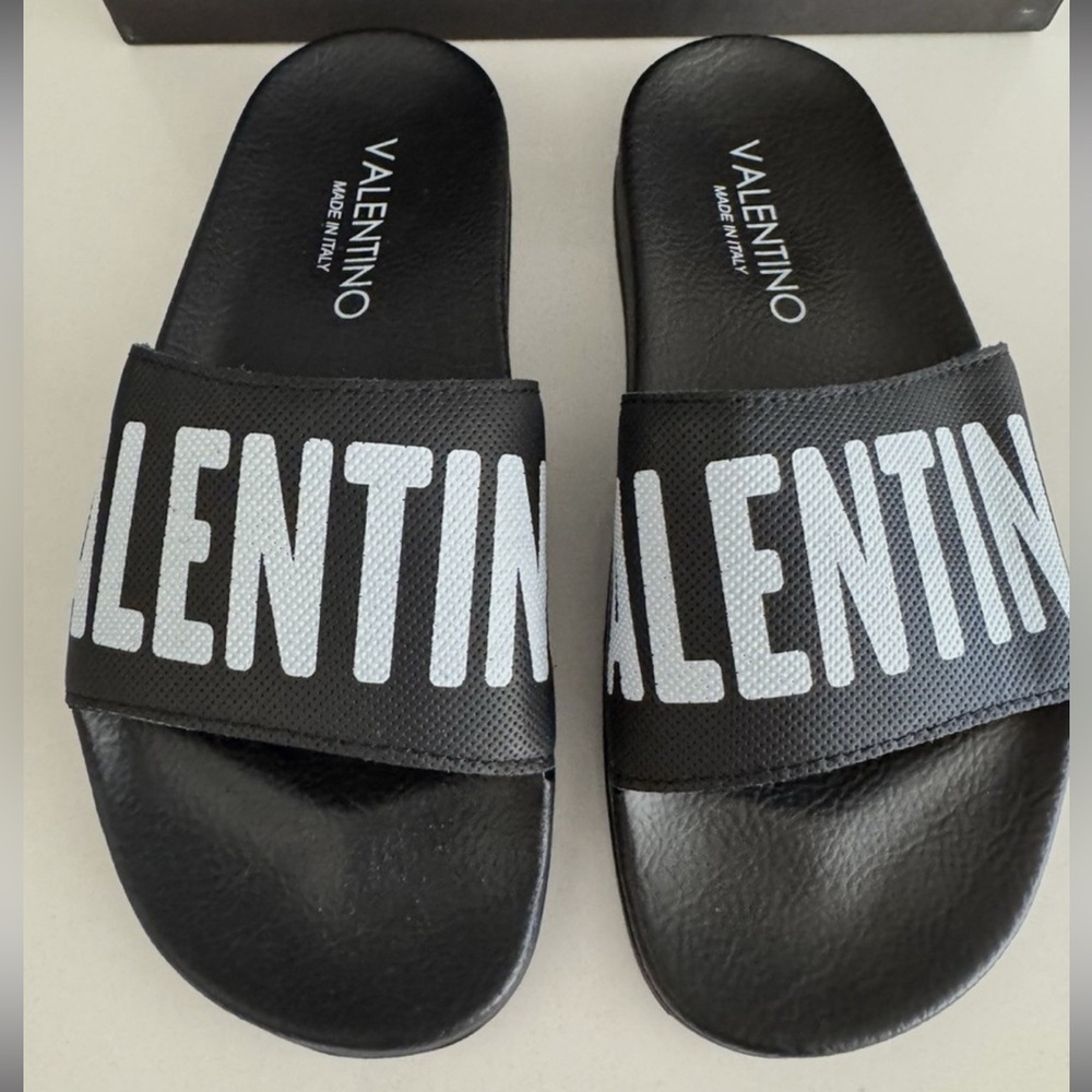Valentino Black Logo Slides